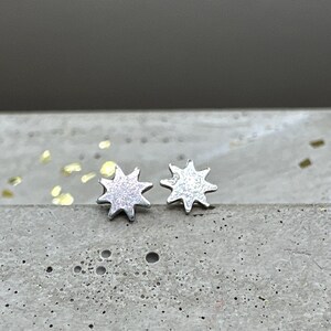 Tiny star earrings