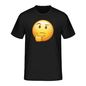 May include: Black t-shirt with a yellow thinking face emoji graphic.