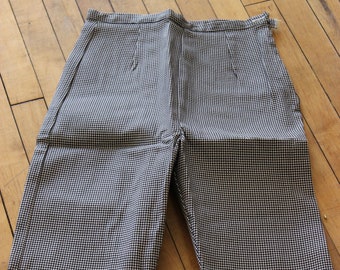 May include: Black and white gingham shorts with a high waist and a straight leg.