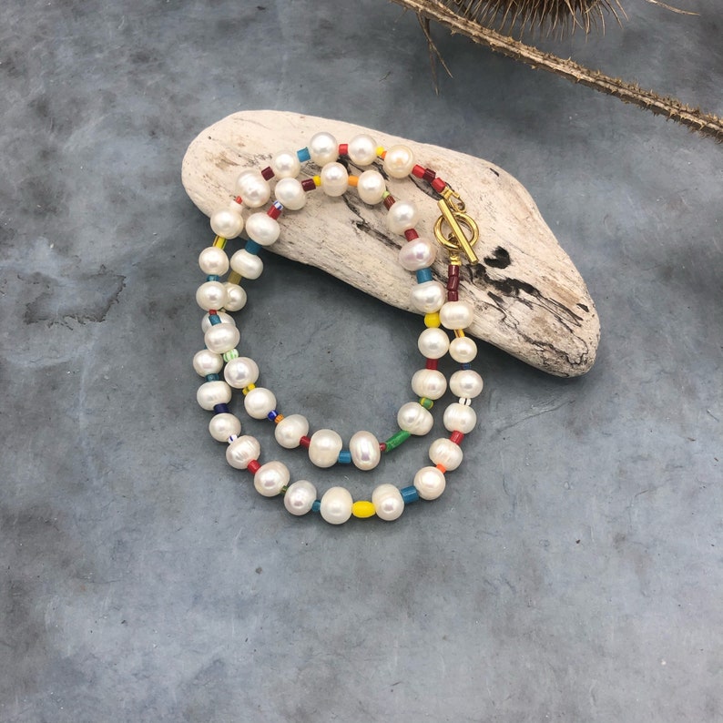 short chain freshwater pearls white with African glass beads