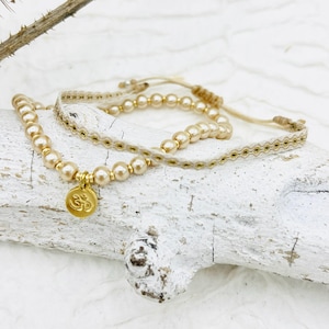 delicate bracelet bracelet set woven beige gold OM pendant