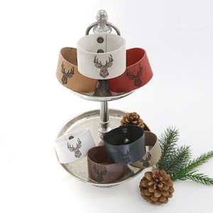 Leather napkin ring with deer engraving