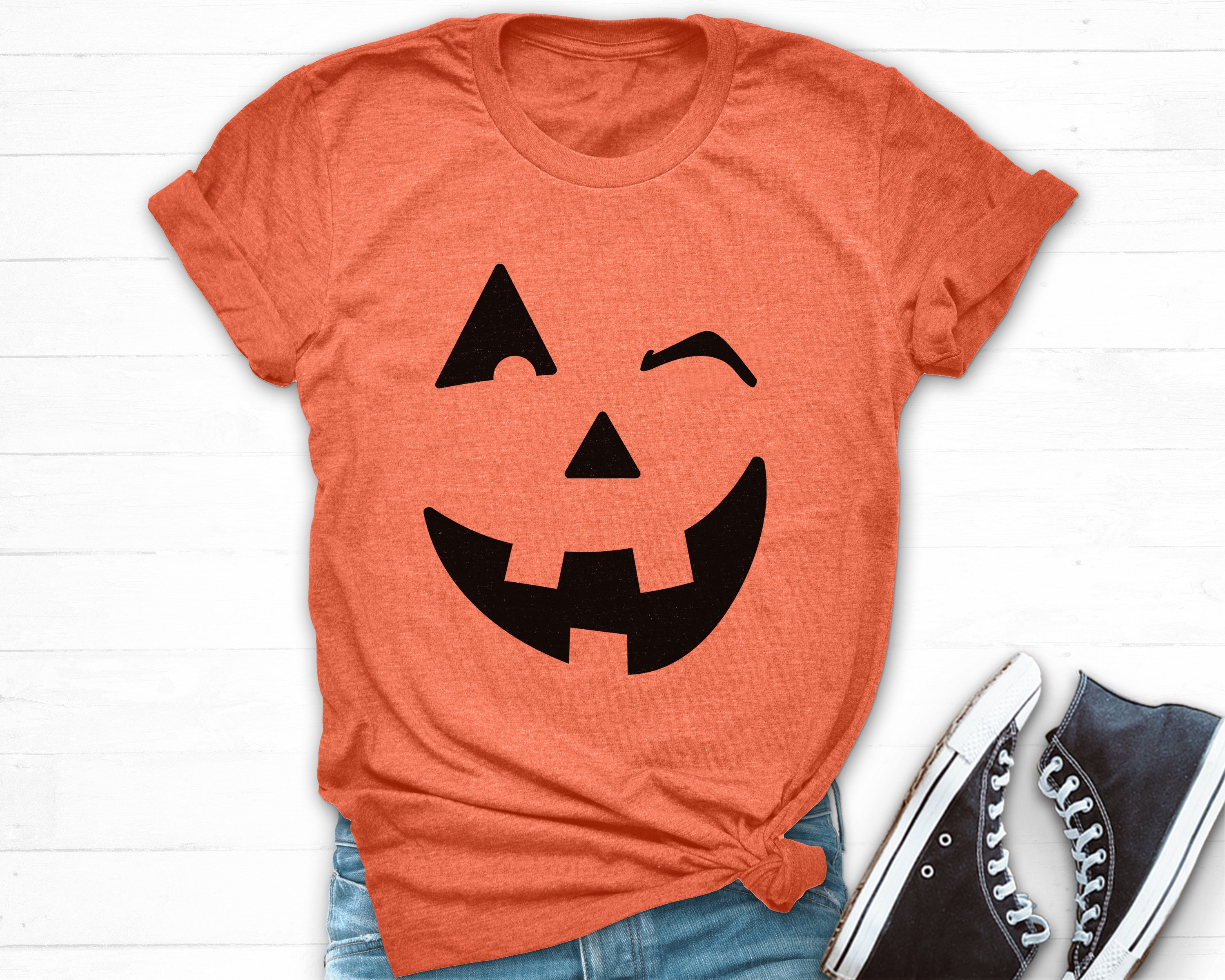 pumpkin face on shirt