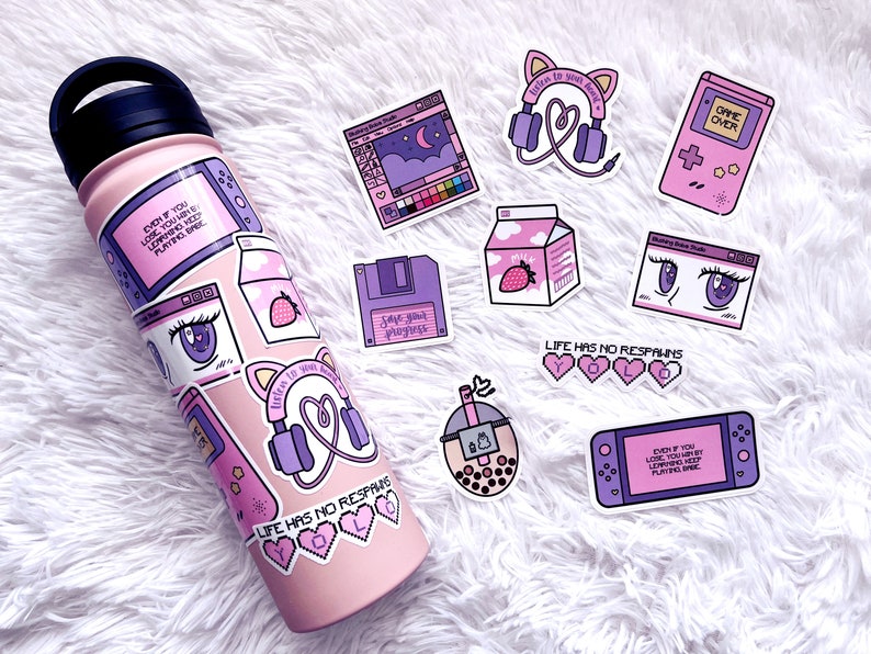 May include: A pink water bottle with various stickers on it. The stickers feature images of a games console, a milk carton, a floppy disk, a computer screen, a cup of boba tea, and a pair of headphones. The stickers also include text such as "Life has no respawns" and "Save your progress".