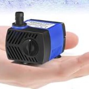 May include: A small blue and black submersible water pump with a black knob on the side. The pump has a clear plastic hose attached to the top.