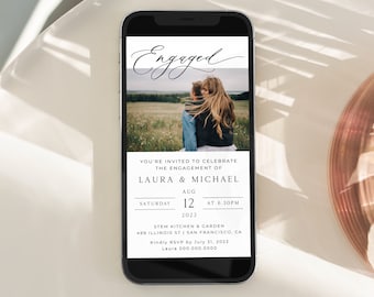 May include: A mobile phone screen displaying a wedding announcement. The announcement is for Laura and Michael's engagement party on August 12th, 2023 at 6:30 PM. The party will be held at Stem Kitchen & Garden, 499 Illinois St, San Francisco, CA. RSVP by July 31st, 2023. The announcement features a photo of the couple.