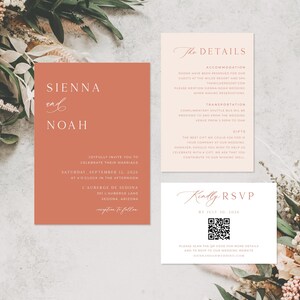 May include: Wedding stationery set with a terracotta invitation card displaying "SIENNA and NOAH". Accompanying cards provide details and RSVP instructions. The invitation includes the date, time, and venue. The set is in shades of terracotta and cream.
