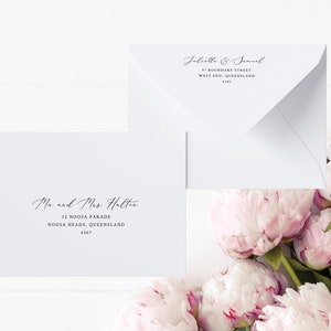 May include: Two white envelopes with handwritten addresses. The top envelope reads "Jabilette & Janel, 47 Boundary Street, West End, Queensland, 4101". The bottom envelope reads "Mr and Mrs Halton, 12 Noosa Parade, Noosa Heads, Queensland, 4567".