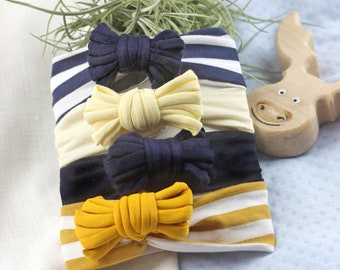 Baby hairband with stripes, stretchy with bow