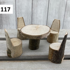 May include: Set of four miniature wooden chairs and a table made from birch logs. The set is perfect for a dollhouse or fairy garden.