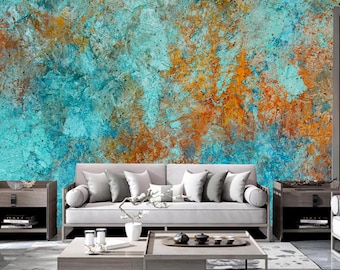 Könnte beinhalten: Abstrakte Wandkunst mit einem strukturierten Hintergrund in Blau und Orange. Die Kunst wird in einem Wohnzimmer mit einer Couch, einem Couchtisch und Beistelltischen präsentiert.