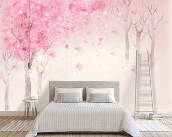 May include: A watercolor painting of a pink cherry blossom tree with white branches and a light pink background. The painting is in a bedroom setting with a white bed and a wooden ladder.