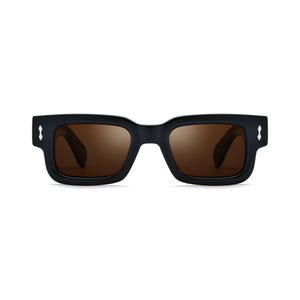 May include: Rectangular sunglasses with a thick black frame and brown tinted lenses. The frame features small, silver-toned metallic accents on the outer corners of the front piece, providing a distinct detail to the solid black construction.