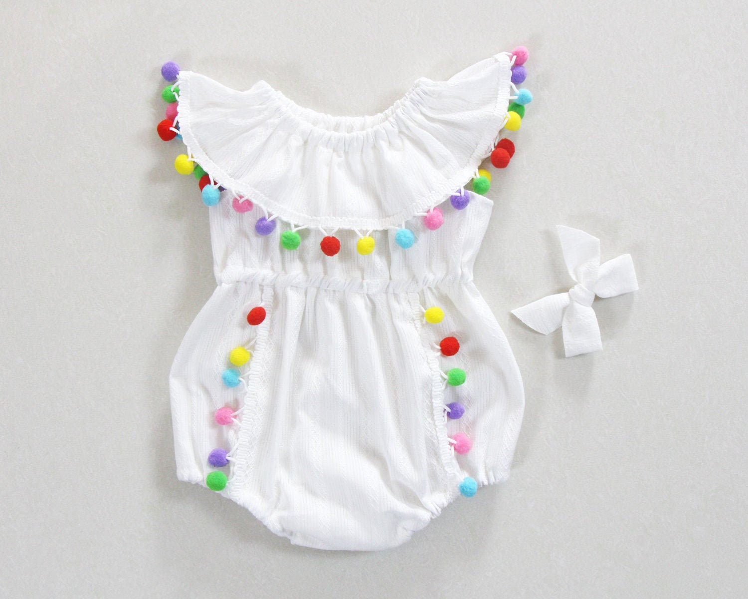 Pom pom romper baby hotsell