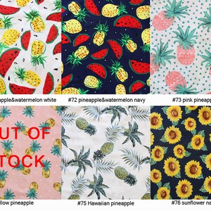 May include: A collection of fabric swatches with various tropical fruit and floral patterns. Designs include pineapples, watermelons, sunflowers, and tropical leaves. The swatches are labeled with numbers and descriptions, including "OUT OF STOCK" on one.