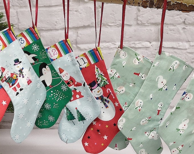 Advent calendar boots, socks, bags made of beautiful printed cotton fabrics, washable green - colorfulAdvent calendar to fill