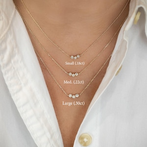 Halsband i 14k guld med tre diamanter: Justerbart triokluster