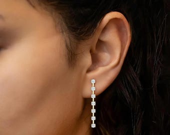 Brincos pendentes com diamantes sintéticos, diamantes redondos cultivados em laboratório de forma sustentável, design minimalista, ouro maciço 14k amarelo, branco e rosé, valor social.