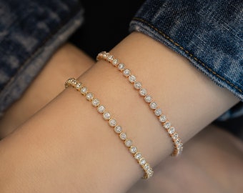 Bracelet tennis diamants, lunette millegrain flexible sertie, jaune 14 carats, rose, or massif blanc, haute joaillerie à valeur sociale