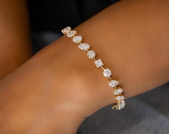 Pulseira em ouro amarelo 14k com diamantes cultivados em laboratório: lapidação pera, marquise e princesa