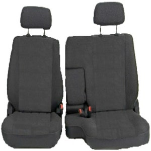 May include: Two black fabric car seat covers with headrests. The seat covers have a center console armrest.