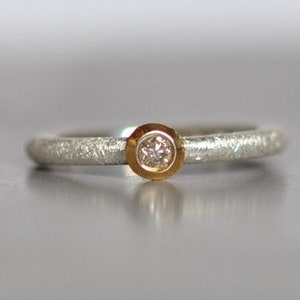 Diamond ring/gold setting/silver ring with diamond and gold setting
