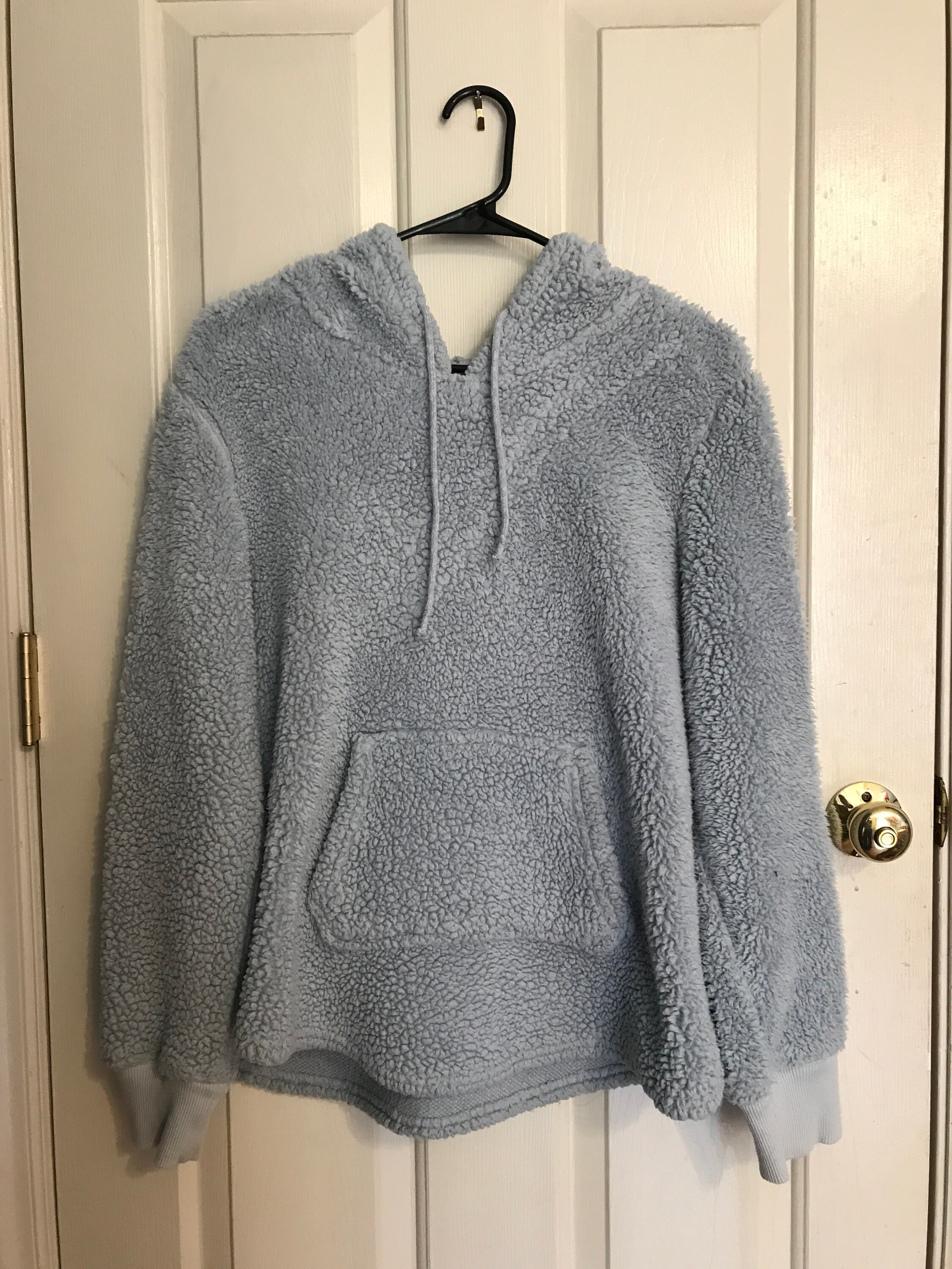blue fuzzy sweatshirt