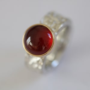 Ring in silver with a beautiful round garnet set in 750 gold by Frank Schwope, red, garnet, unique jewelry, goldsmith&#39;s work, ring, noble