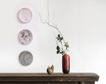 Oval wall decoration pieces with marble finish by Extra&ordinary design