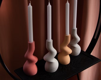 Sculptural tall candle holder