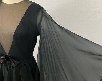 dress with wing sleeves