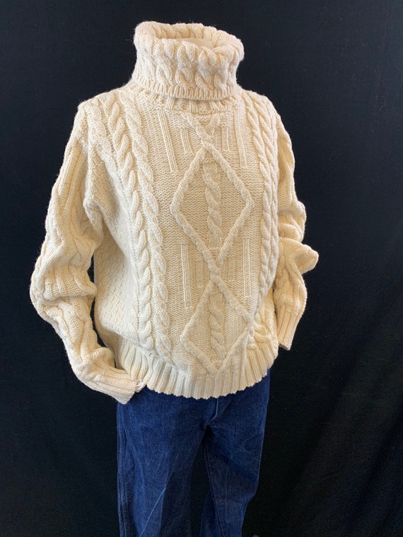 Ivory fisherman knit turtleneck sweater
