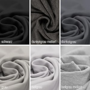 May include: Six fabric swatches in different shades of gray, including black, dark gray, light gray, and variations with a heathered texture. The swatches are arranged in two rows of three, with the darkest shades at the top and the lightest shades at the bottom.