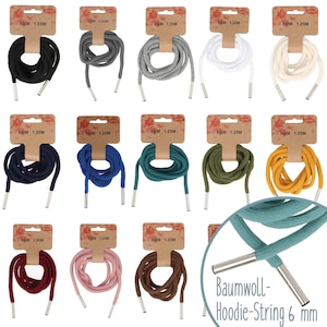 Puede incluir: Surtido de 12 colores de cordones de sudadera de algodón de 6 mm, cada uno de 1,25 metros de largo. Los cordones están empaquetados en tarjetas individuales con el texto "6MM 1,25M" y "OPRY".