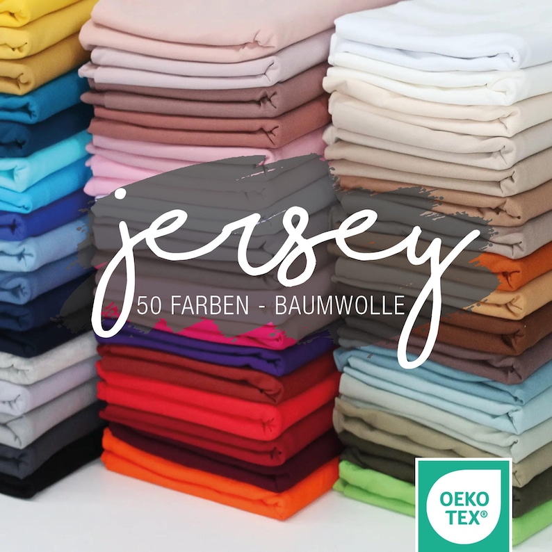 May include: A stack of 50 different colored cotton jersey fabrics. The fabrics are folded and stacked in a rainbow pattern. The text "jersey 50 FARBEN - BAUMWOLLE" is visible in the center of the image. The Oeko-Tex logo is visible in the lower right corner of the image.