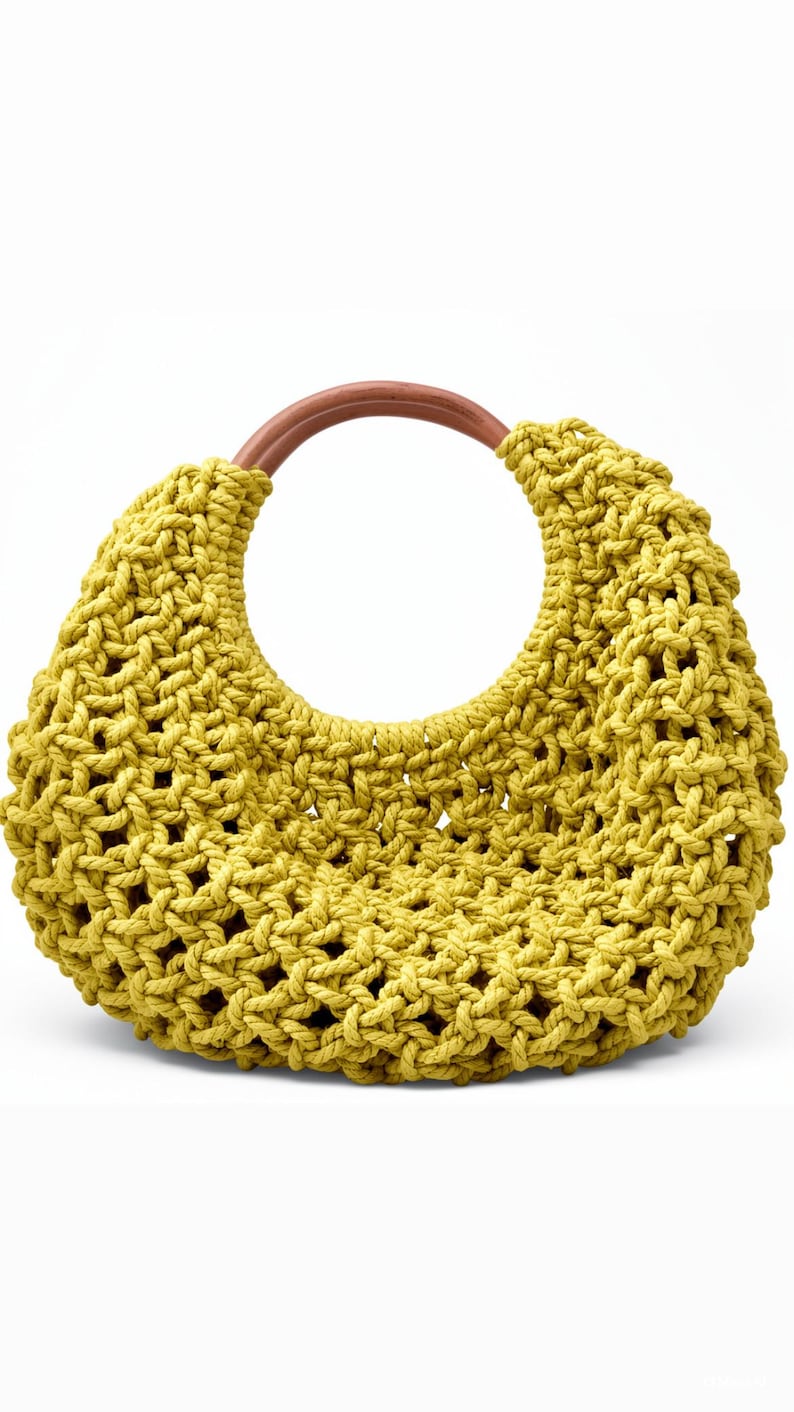 May include: A crescent-shaped handbag crafted from thick, chartreuse-colored cord in an open macrame knot pattern. The bag features a single, smooth, circular wooden handle in a warm brown tone that integrates into the top of the structure.