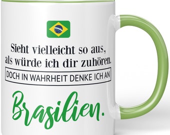 JUNIWORDS Tasse "Sieht vielleicht so aus, als würde ich dir zuhören. Doch in Wahrheit denke ich an Brasilien." - 100 % Made in Germany