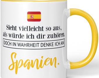 JUNIWORDS Tasse "Sieht vielleicht so aus, als würde ich dir zuhören. Doch in Wahrheit denke ich an Spanien." - 100 % Made in Germany