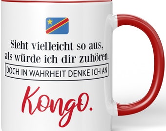 JUNIWORDS Tasse "Sieht vielleicht so aus, als würde ich dir zuhören. Doch in Wahrheit denke ich an Kongo." - 100 % Made in Germany