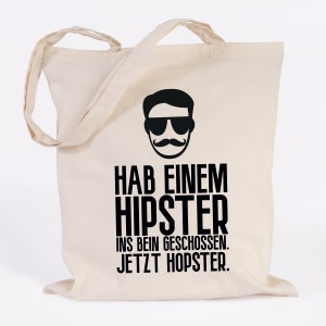 JUNIWORDS Jute bag "Shot a hipster in the leg. Now hopster." - 100% Made in Germany