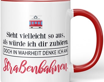 JUNIWORDS Mug "Maybe it looks like I'm listening to you. Actually I'm thinking about trams." - 100% Made in Germany