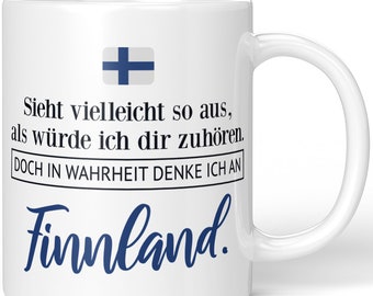 JUNIWORDS Tasse "Sieht vielleicht so aus, als würde ich dir zuhören. Doch in Wahrheit denke ich an Finnland." - 100 % Made in Germany