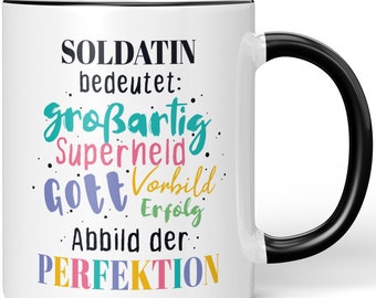 JUNIWORDS Tasse "Soldatin bedeutet Gott, Vorbild, Superheld, großartig, Abbild der Perfektion" - 100 % Made in Germany