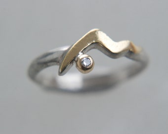noble ring with brilliant in 24ct. gold setting, ...