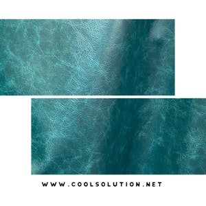 May include: Two rectangular pieces of teal-colored leather with a textured, distressed appearance. The leather has a mottled effect with lighter and darker areas, and fine lines throughout. The website address "WWW.COOLSOLUTION.NET" is printed in black at the bottom.