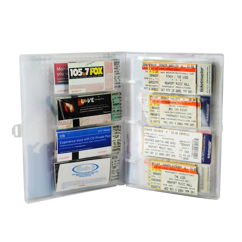 May include: A clear plastic ticket holder with multiple ticket stubs inside. The tickets are for various concerts and events, including "The Used", "Box Car Racer", and "Medeski Martin and Wood".