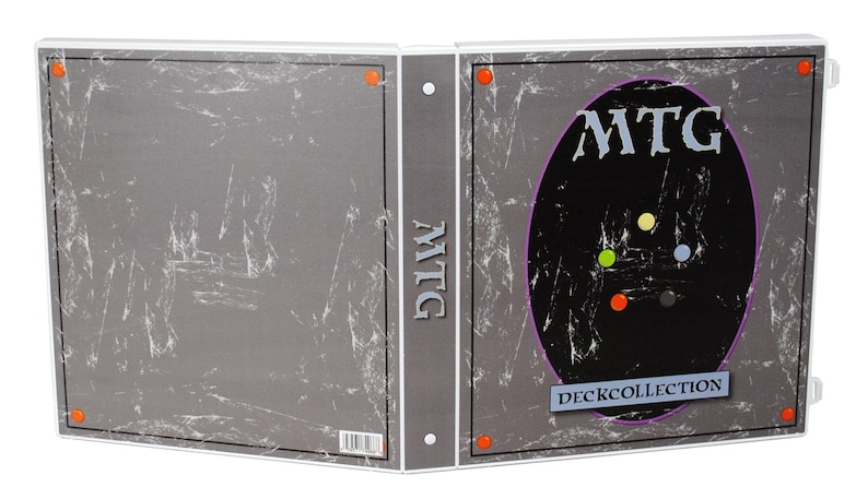 May include: A white binder with a grey and black cover. The cover has the text "MTG DECK COLLECTION" and a black circle with the text "MTG" in white. The binder is closed.