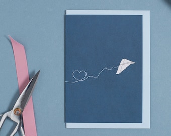 Valentines card paper plane with heart in blue for Valentine's greetings, as Father's Day card, love card for him, wedding card, anniversary