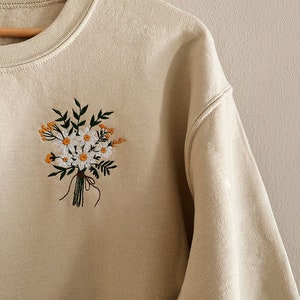 Sweater with floral embroidery
