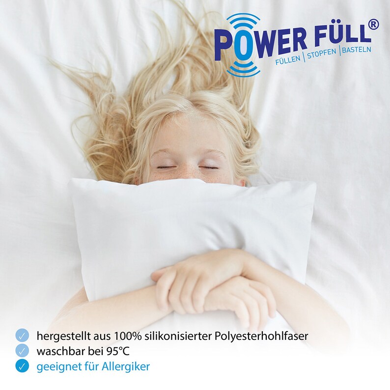 May include: A young girl sleeps soundly on a white pillow with the text "POWER F&Uuml;LL&reg; F&Uuml;LLEN STOPFEN BASTELN" above her. The text below the image reads "hergestellt aus 100% silikonisierter Polyesterhohlfaser waschbar bei 95&deg;C geeignet f&uuml;r Allergiker".